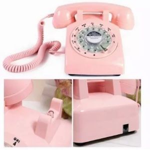 Pink rotary phone.